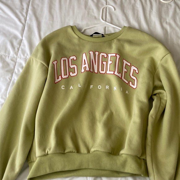 Large sized green sweatshirt with Los Angeles writing. - Picture 1 of 4